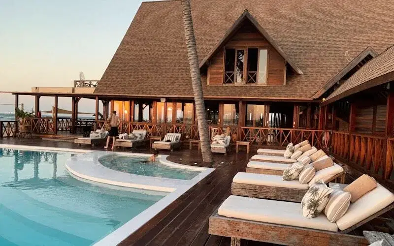 Luxury spa hotel resort with relaxing pool area and wellness facilities, showcasing automated hotel booking