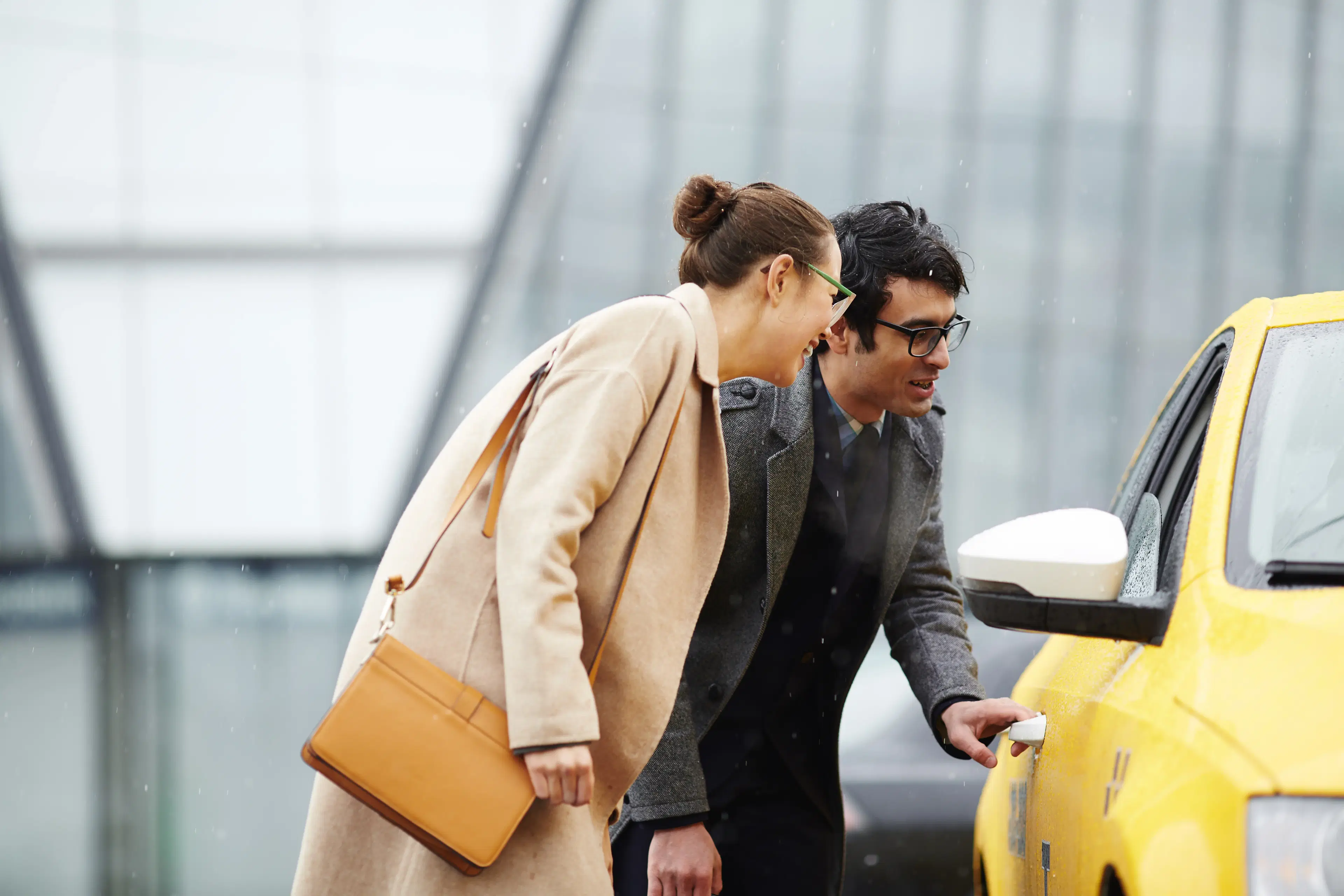 Professional taxi service with modern vehicle ready for airport transfer, showcasing mobility booking automation